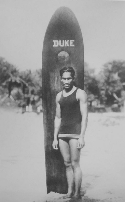 Duke Paoa Kahanamoku with his surfboard https://upload.wikimedia.org/wikipedia/commons/