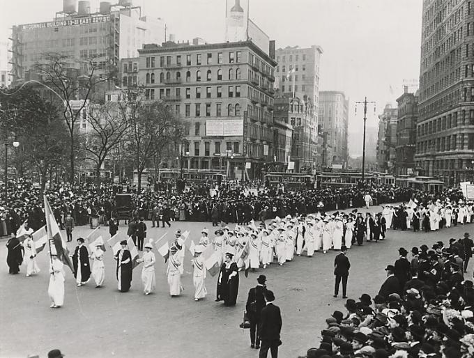 In 1913, women suffragettes march in New York for the right to vote.