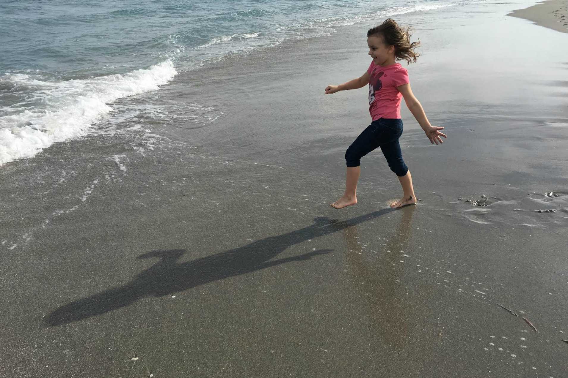 Monica Gallipeau on Delray Beach in Florida about 3pm. Monica's older sister, Mary Rose ('16) took this image on her iPhone 6s. Mary Rose said, "The picture is 100% natural; she didn't even know I was taking the pictures."