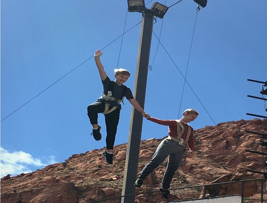 Logan Watts (left) and Em Grosland (right) rehearse a flight sequence for Peter Pan 