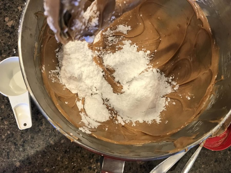 Add powdered sugar and beat on low speed until smooth. 