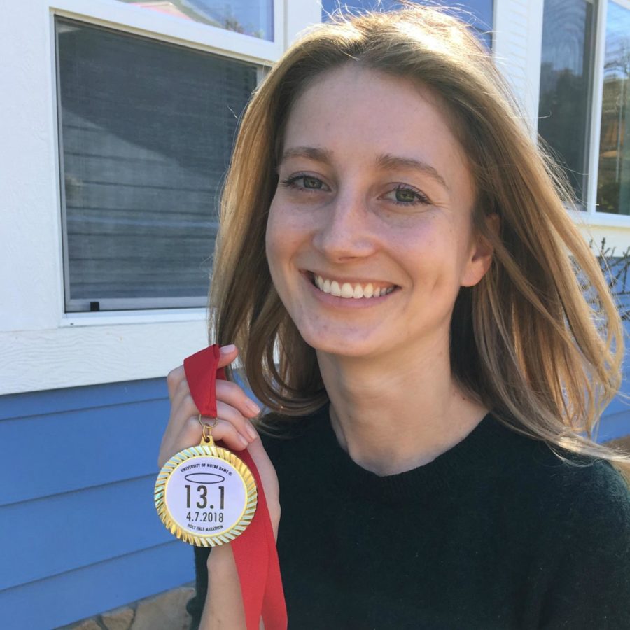 Annie McCarthy smiles for the camera after completing the 1/2 marathon. 