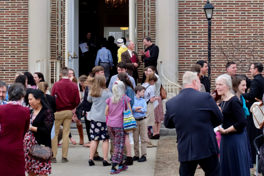 People gather outside Olivia Music Hall after the open house to talk with TAC faculty and amongst each other. 