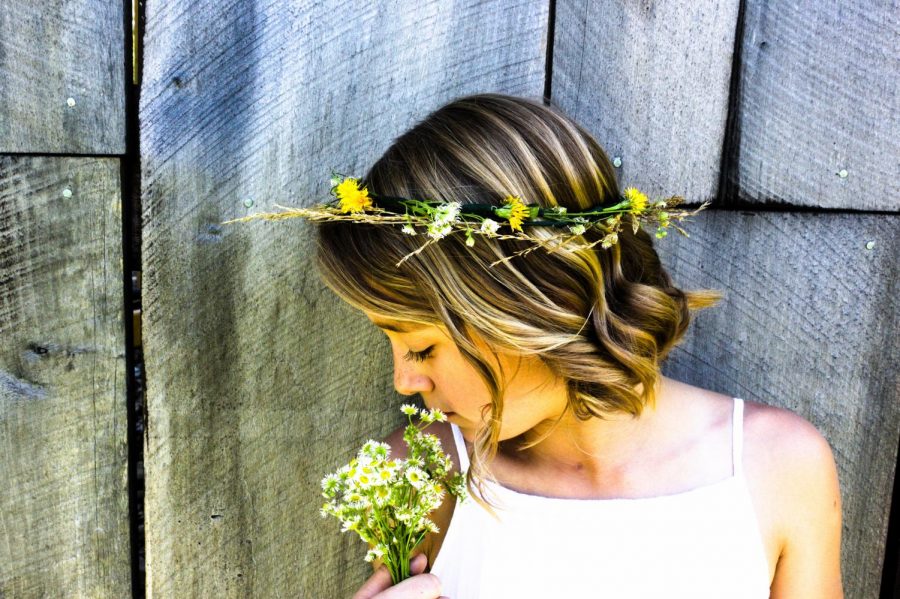 If you cant use your siblings as your models, what else are they for? ;) This is a portrait of my ten year old sister (also a MODG student) along side of and old shed in our neighbors feild. She said the flowers didnt really smell that good, but she sniffed them all the same. Shes a trooper! 