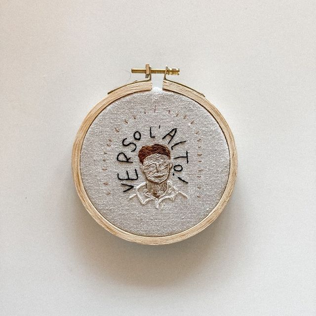 One of Mikaelas sacred art images. An embroidered portrait of Bl. Pier Giorgio with the words Verso Lalto! as a hallow around his head. 