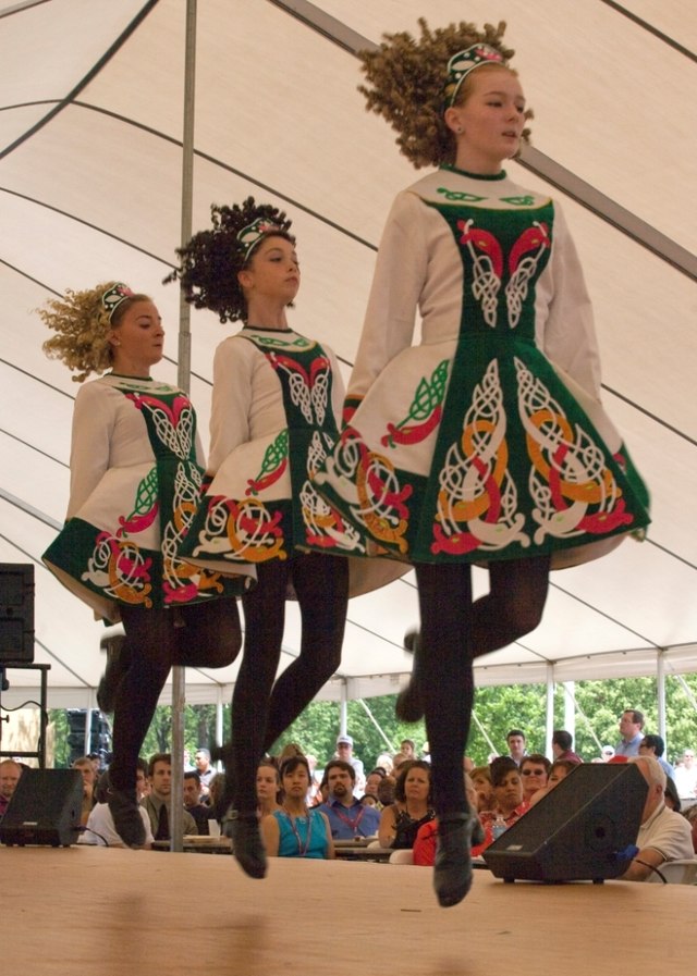 Members of the Davis Academy of Irish Dance leap before the Picatinny crowd