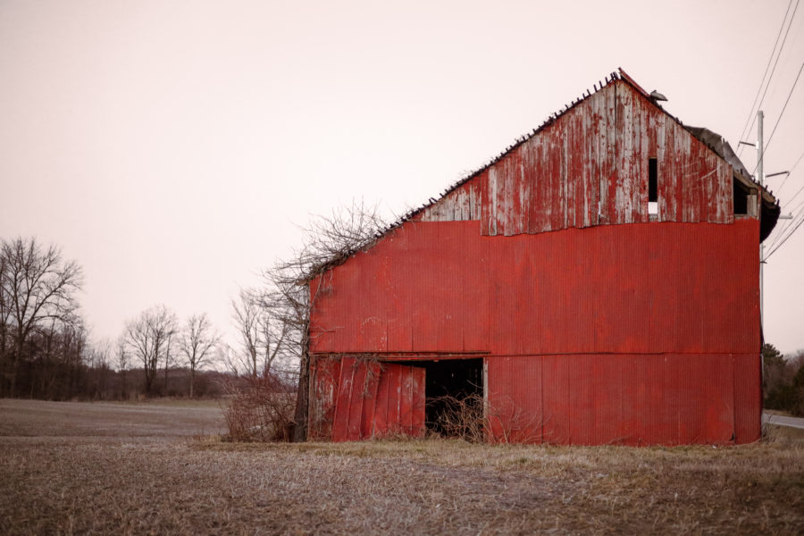 An old barn on a cloudy day.